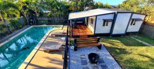 awesome tiny home in backyard - landscaped with pool